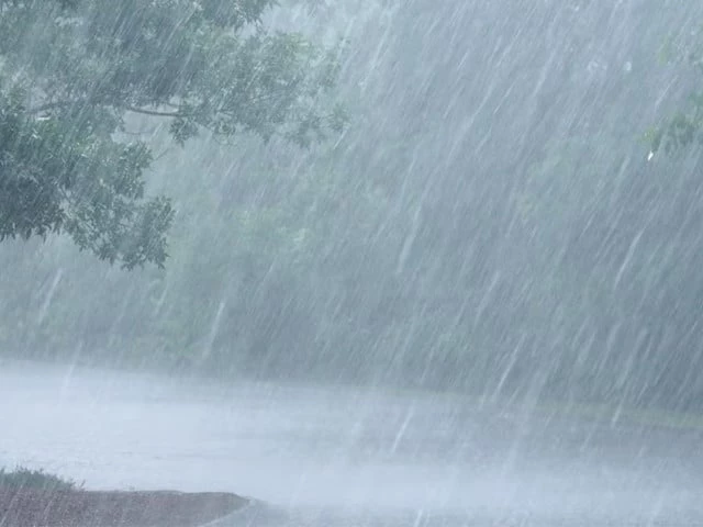 Heavy Rain and Hail Batter K-P, Trip 83 Power Feeders Across Province Heavy rain falling on a road in Khyber-Pakhtunkhwa during the K-P rain hailstorm