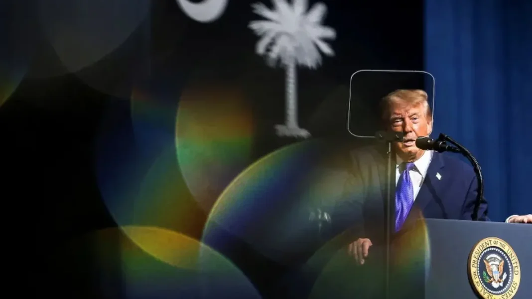 Trump Cancels Kansas and Iowa Rallies Before Midterms Donald Trump speaks at a podium during a campaign rally - Trump cancels Kansas Iowa rallies