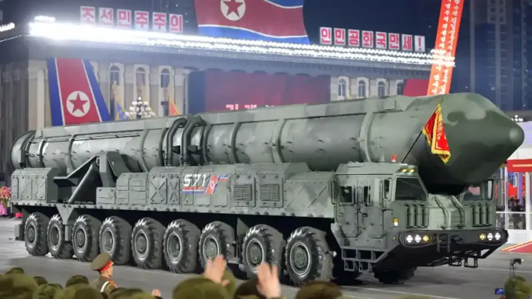 US, South Korea, Japan Vow North Korea Denuclearisation A North Korean missile on a launcher at a parade, North Korea denuclearisation talks