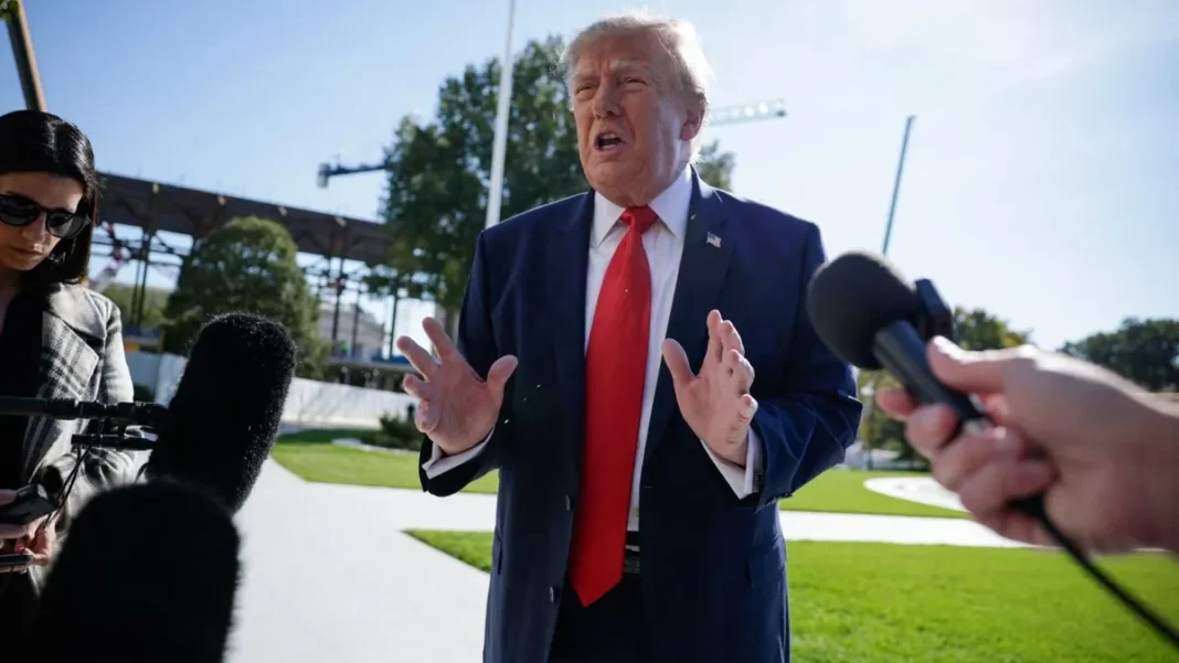 Trump Iran Strike or Deal Warning at Rally Donald Trump speaks to reporters about a Trump Iran strike or deal
