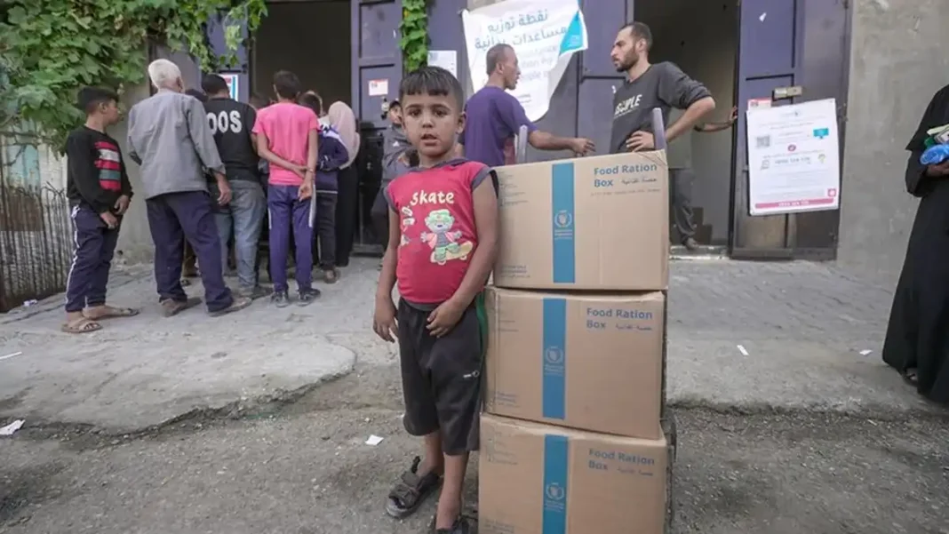 UN Food Agency Slashes Gaza Aid for 500,000 as Funds Run Out WFP food ration boxes at a Gaza distribution point amid Gaza food aid cuts