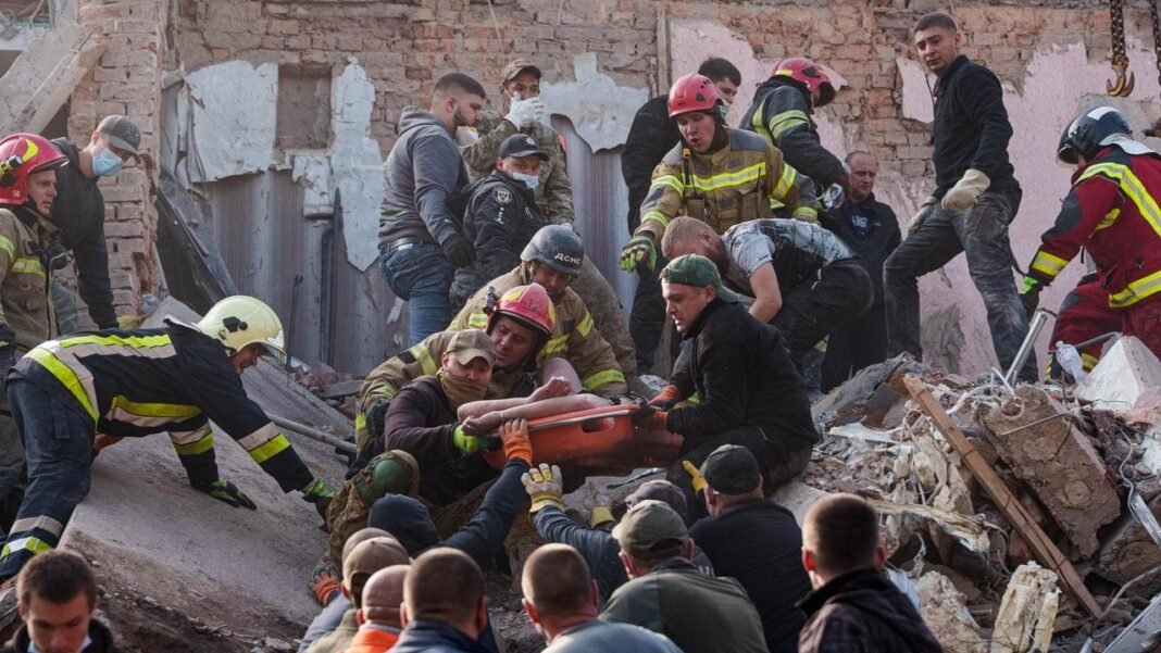 Zelenskiy accuses US of inaction as Russian strikes kill 78 in two days Rescue workers carry an injured survivor in Pryluky after Russian strikes killed 78 across Ukraine as Zelenskiy accuses US of inaction