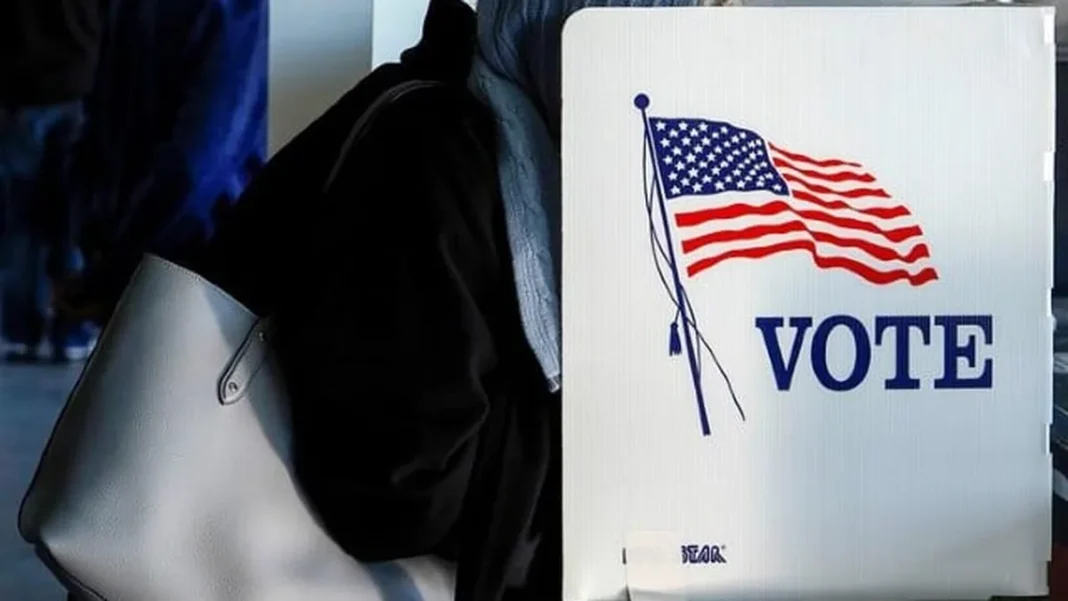 US Justice Dept Pressures California Counties A voter casts a ballot at a polling booth in a file photo about California voter rolls