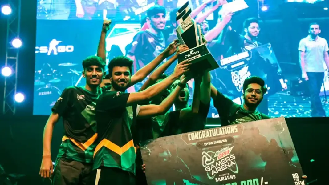 E-Sports Set to Join Pakistan’s National Sports System with Federation and First Championship Pakistani esports players lift a trophy on stage during a national gaming tournament