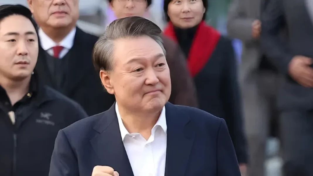 Yoon Faces Death Penalty Call at Appeal Former South Korean president Yoon Suk Yeol walks with aides, face in frame — Yoon death penalty appeal