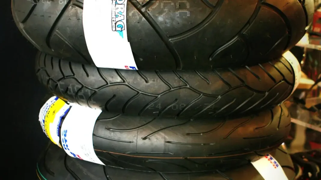 ECC Raises Import Duty on Bike Parts to 31%, Sparking Tariff Policy Row Stacked motorcycle tyres as import duty bike parts rises to 31 per cent in Pakistan