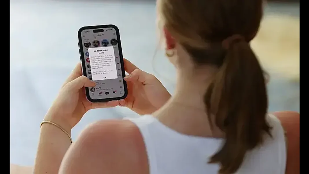 Turkiye Bans Social Media for Under-15s From November 1 Teenager holding a phone as the Turkiye under-15 social media ban takes effect November 1
