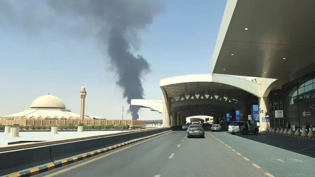 Houthi Strikes on Riyadh Airport Kill 14 as Saudi Coalition Hits Yemen Fuel Sites Houthi Riyadh airport attack: smoke rises over King Khalid International Airport in Riyadh