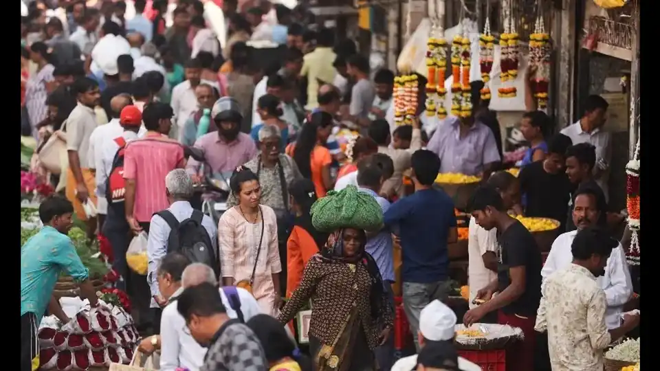 IMF projects India will overtake Japan as world’s fourth-largest economy in 2027 Busy Indian market street - India fourth largest economy 2027 IMF projection
