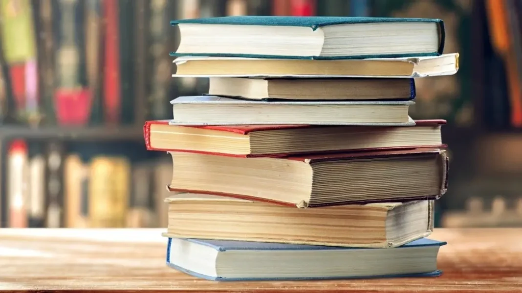 Pakistan Approves New National Curriculum for Schools A stack of school textbooks, new national curriculum