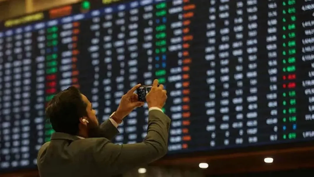 Pakistan Mutual Funds Assets Hit Rs4.72 Trillion Investor photographing PSX share-price board — Pakistan mutual funds assets