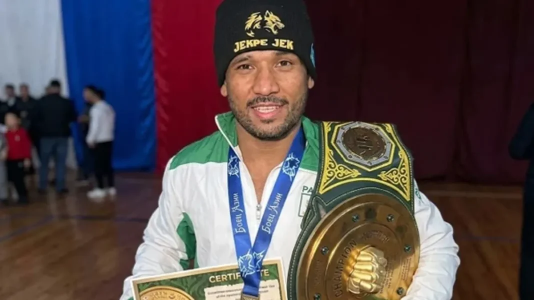 Sherbaz Marri MMA Gold Win in Kazakhstan Sherbaz Marri holds a championship belt and medal after his Sherbaz Marri MMA gold win.