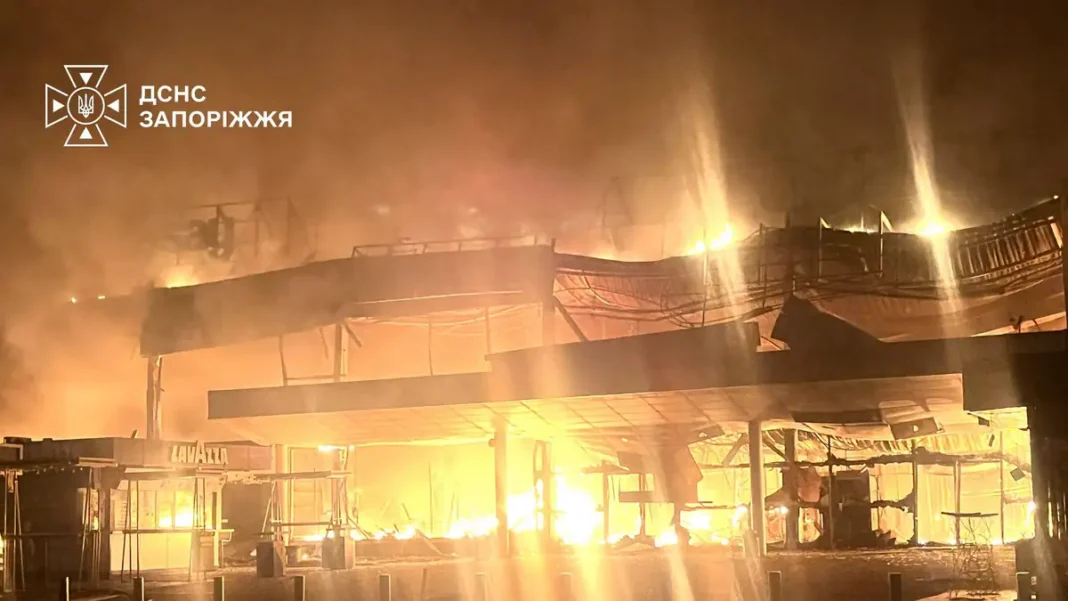 Russian Strikes Kill 11 in Zaporizhzhia, Including Three Children Fire rages in a Zaporizhzhia building after the latest Zaporizhzhia strikes on the city