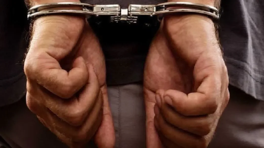 Four Islamabad police officers arrested for armed robbery at Chinese nationals’ home Handcuffed hands after Islamabad police officers arrested in the F-7/1 robbery case