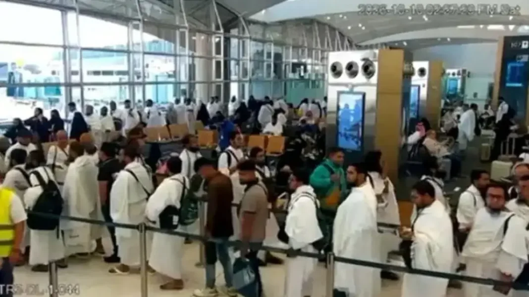 Riyadh Airport Closure Extended as Saudi Arabia Completes Safety Checks After Weekend Strikes Riyadh airport closure: Umrah pilgrims queue for a document check at King Khalid International Airport in a still from footage released on Monday