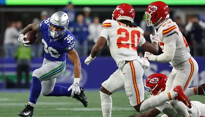 Seahawks End Chiefs Unbeaten Run 20-3 Seattle Seahawks running back George Holani carries the ball against the Kansas City Chiefs in the game where the Seahawks end Chiefs unbeaten run.