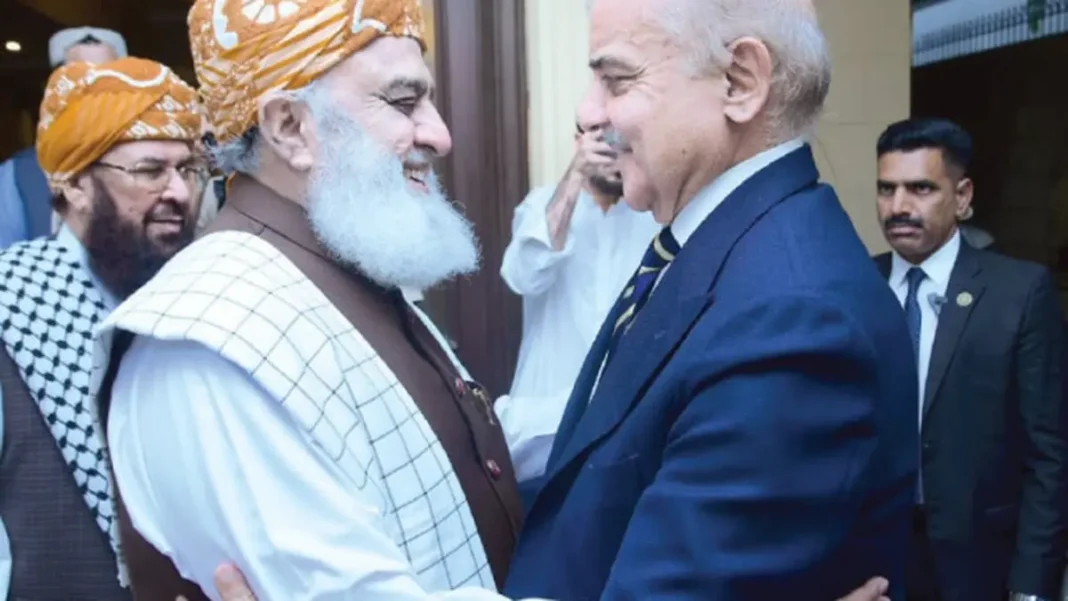 Shehbaz Phones Fazlur Rehman as Centre-KP Tensions Deepen JUI-F chief Maulana Fazlur Rehman greeting Prime Minister Shehbaz Sharif amid easing Centre-KP tensions