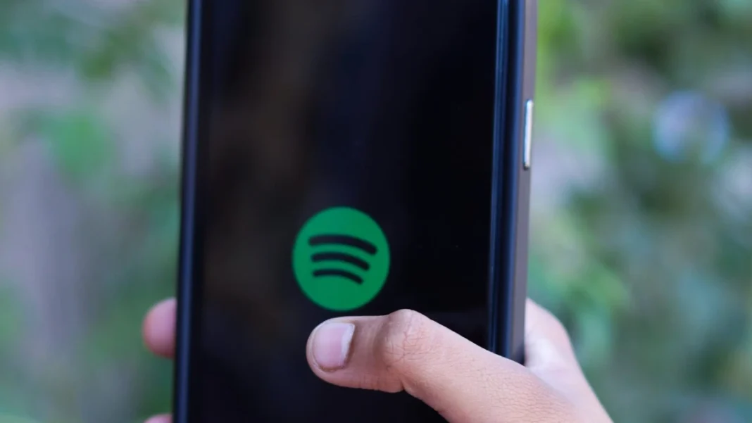 Spotify tightens Family plan sharing with in-person QR code checks Smartphone showing the Spotify app as the Spotify Family plan faces QR checks