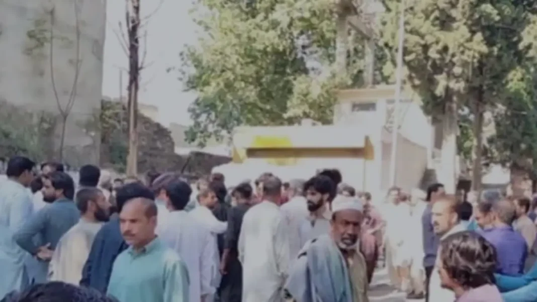 Taxila Check Post Death Sparks Police Inquiry People gather after the Taxila check post death, as residents protest at the scene