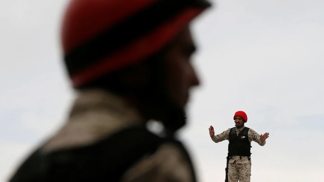 Six Killed in Jordan Church Attack as Gunmen Fire on Funeral in Karak A Jordanian soldier in a red beret during an earlier security operation; the Jordan church attack in Karak is a rare act of violence in the kingdom