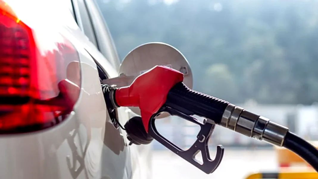 Petrol Up Rs145 a Litre in 2026 as Daily Price Revisions Bite Petrol price rise 2026: a red fuel nozzle fills a car at a petrol station in Pakistan