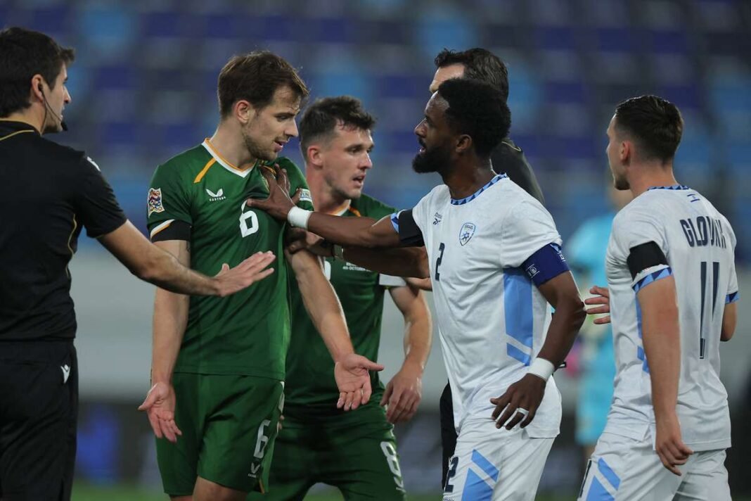 UEFA Investigates Alleged Spitting Incident in Ireland v Israel Nations League Clash Ireland and Israel players in a heated confrontation during the Nations League match under spitting investigation