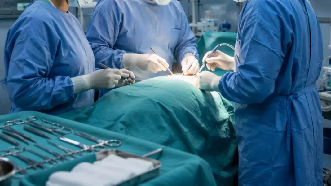 Bandages Left Inside Woman for a Year at AJK Hospital; Inquiry Ordered Surgeons operate in a theatre; bandages left inside a woman at an AJK hospital have led to an inquiry