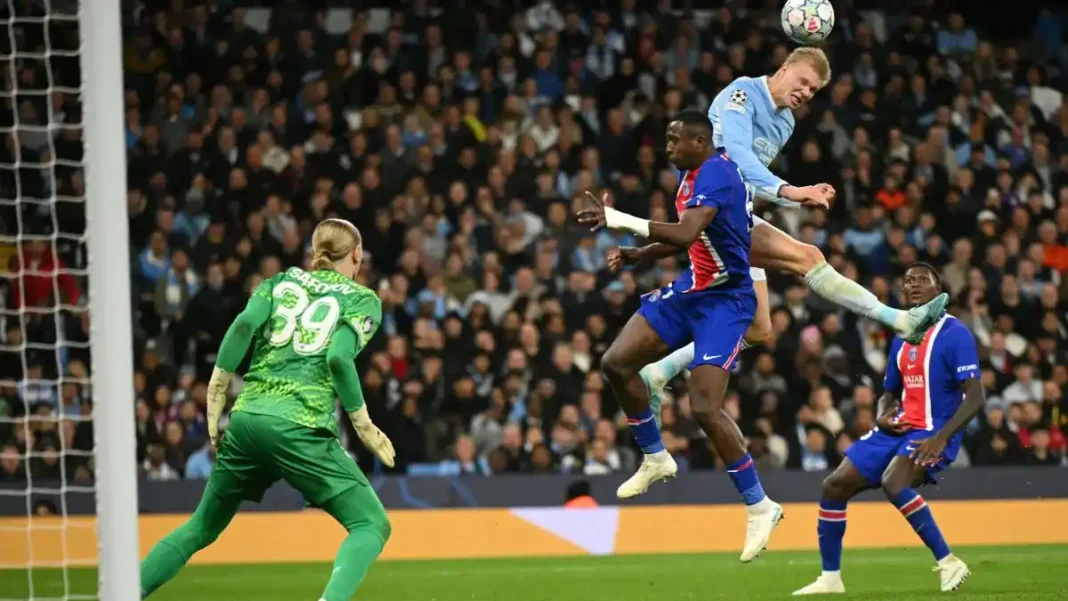 PSG Beat Manchester City 4-2 in Champions League Thriller at the Etihad Erling Haaland heads at goal during Manchester City's 4-2 Champions League defeat to PSG