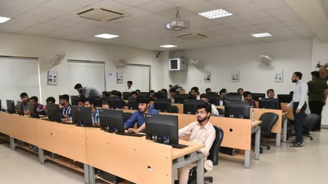 Poor Links, Few Trainers: Why AI Training Is Not Reaching Rural Pakistan AI training Pakistan: students at computers during an IT training session