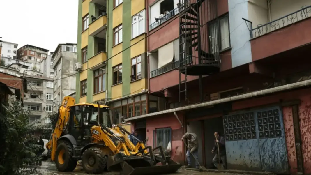 Three Dead, Five Missing as Istanbul Sees Heaviest Rainfall in 80 Years Digger clearing mud in an Istanbul street after the Istanbul heaviest rainfall 80 years event