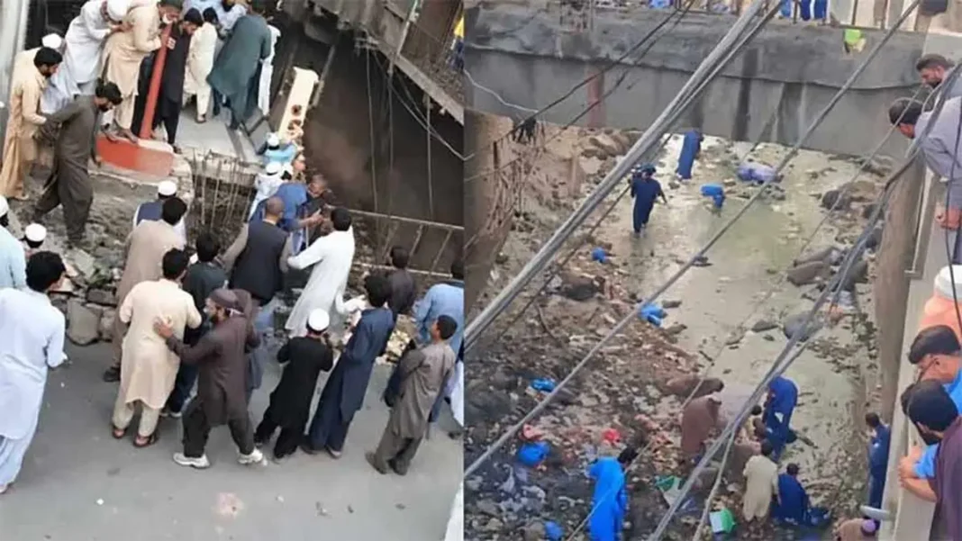 Two Die in Shangla Staircase Collapse During Drive Shangla Aloch Bazaar collapse scene with rescue workers — Shangla staircase collapse