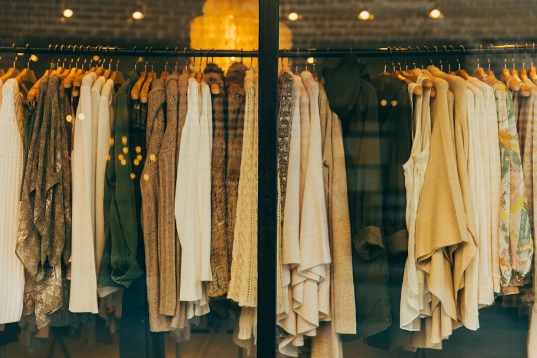 Lifestyle Creep: Why Your Raise Disappears and How to Stop It Expensive clothing on store racks, a classic sign of lifestyle creep after a pay rise