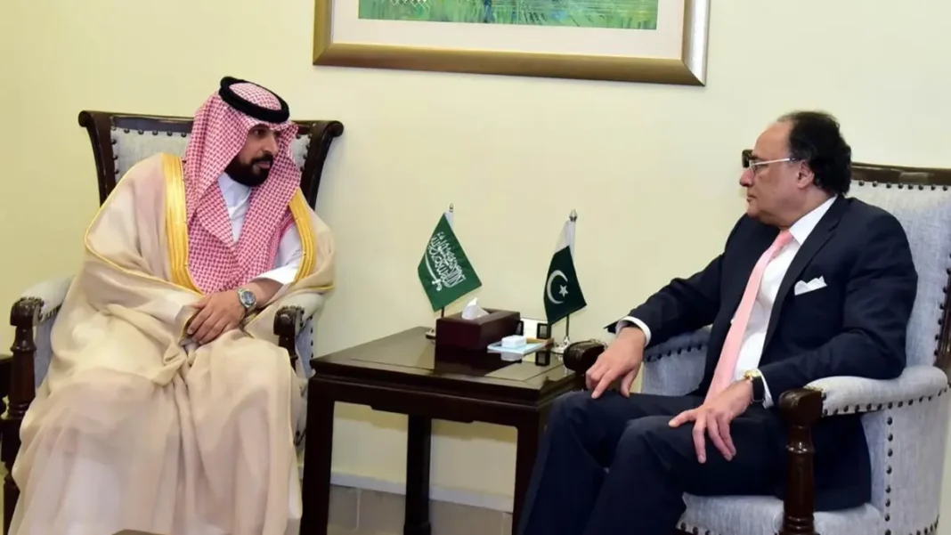 Pakistan Seeks More Saudi Investment in Key Sectors Finance Minister Aurangzeb meeting Saudi Ambassador with flags — Pakistan Saudi Arabia investment
