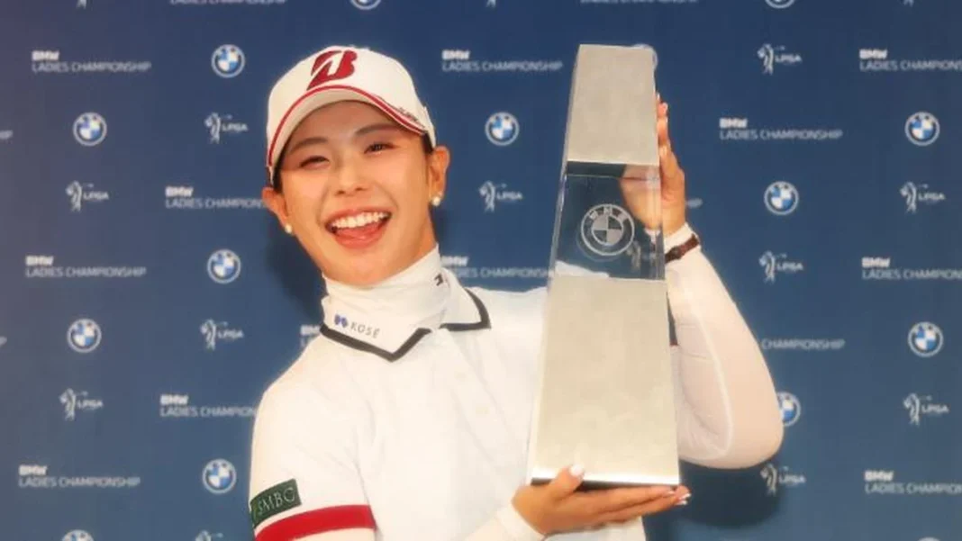 Yoshida Wins First LPGA Title in South Korea Yuri Yoshida LPGA title — holding the BMW Ladies Championship trophy