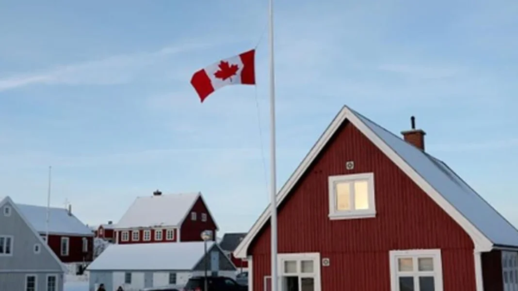 Canada Sets $1.5m Fines for Immigration Fraud Canadian flag in front of red houses in snow — Canada immigration fraud fines