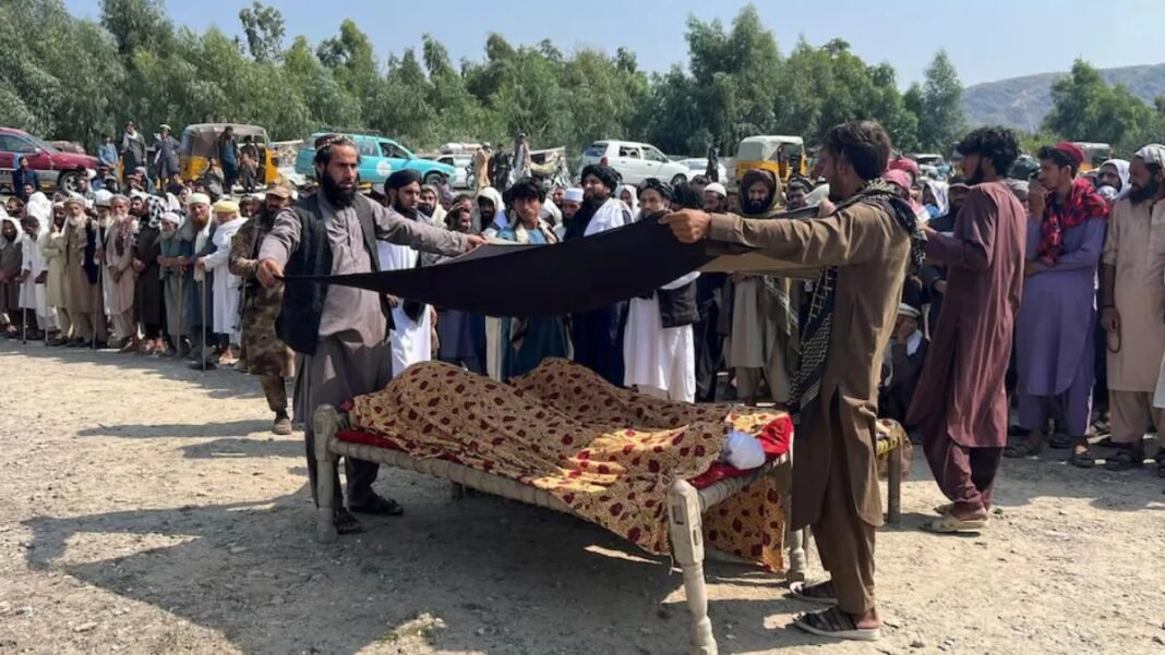 Pakistan Confirms Calibrated Airstrikes in Afghanistan, Claims 22 Militants Killed Aftermath of Pakistan airstrikes in Afghanistan as residents carry a body