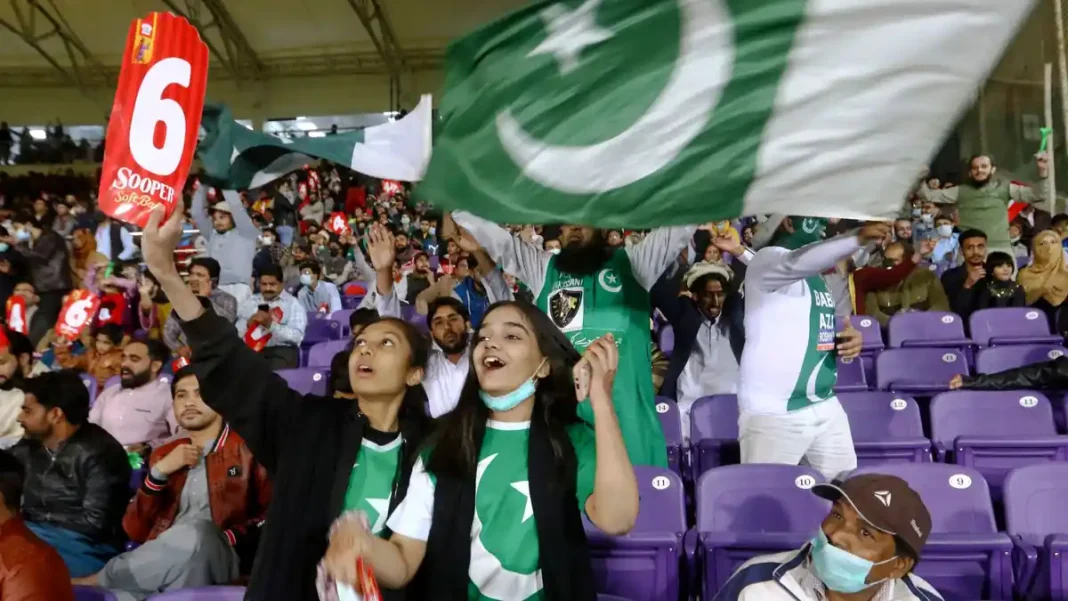 Cricket Match in Lahore: The Complete Fan Guide Pakistani cricket fans waving flags in a packed stadium