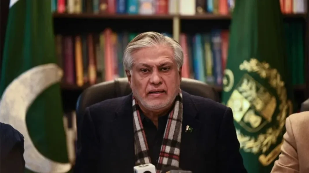 Pakistan Wazir Kharja Name (2026): Who Holds the Office Ishaq Dar speaking at an official briefing with Pakistani flags
