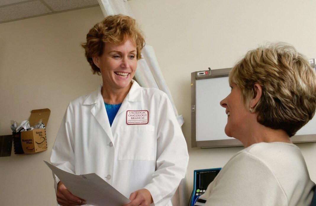 PCOS Treatment Options: Medicines, Lifestyle and Natural Support Doctor talking with a woman patient about PCOS treatment options in a clinic