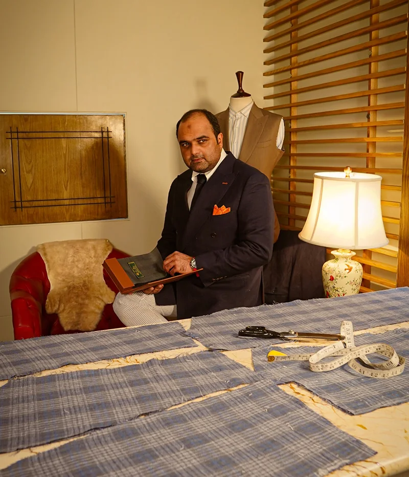 Sarfaraz Akbar Petronius Award winner at work in the Ambassador bespoke tailoring atelier in Karachi